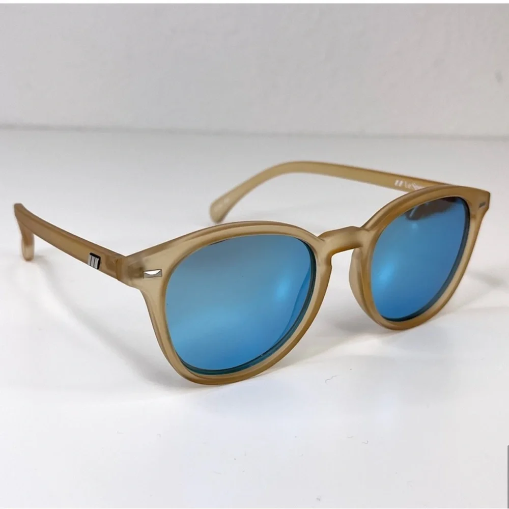 LE SPECS Bandwagon Sunglasses NEW Raw Sugar Frame With Blue Mirror Lens